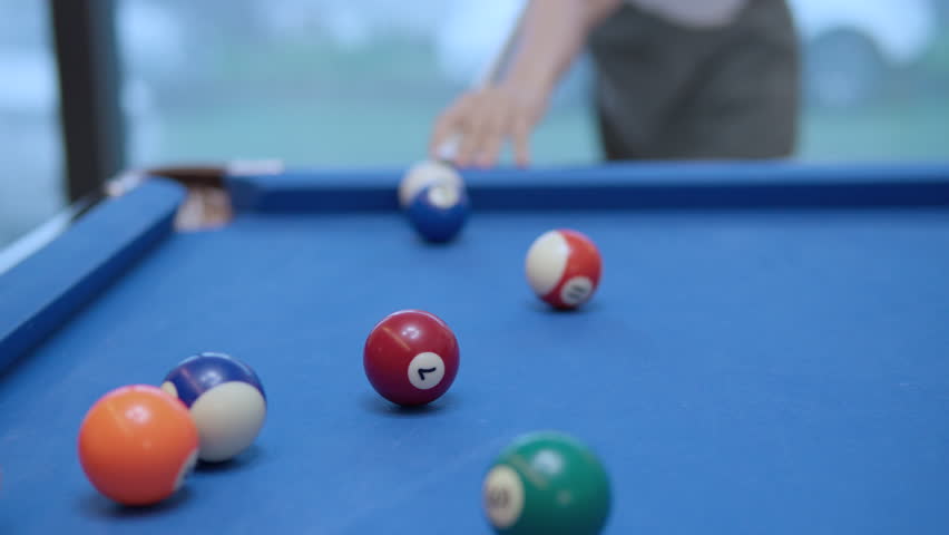 Woman Playing Billiard, Hitting The Cue Ball With A Snooker Cue On Table. - Close Up Shallow Focus on Balls | Shutterstock HD Video #1107138931