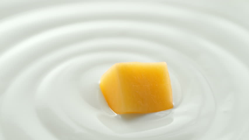 Mango Scooped with Silver Spoon from Creamy Thick Yogurt in Macro and Slow Motion Royalty-Free Stock Footage #1107140081