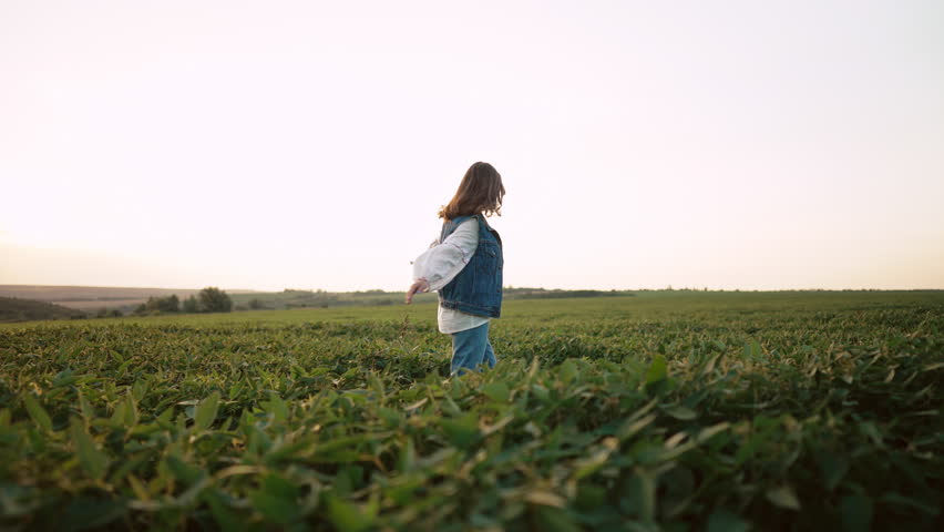 Woman spinning around, open arms. Hands up. Free girl, amazing summer adventure
