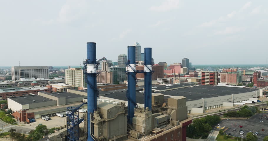 Aerial View Of Power Line At Indianapolis Downtown And City Skyline At Background In Indiana, United States. wide shot