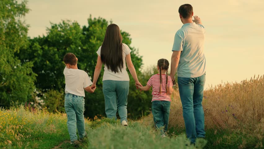 Happy family team, children, parents, run together in park on grass. Family game Concept, father mother daughter son fun running. Children dream, mom dad children in nature. Weekend play, holiday Royalty-Free Stock Footage #1107147427
