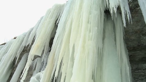 Icicle hanging from the eroded limestone coast on the island of Gotland in the Baltic sea in Sweden
