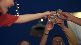 Group of Diversity Asian people friends enjoy and fun celebration meeting dinner party eating barbecue grill and drinking Korean vodka together at outdoor rooftop on summer holiday vacation at night. - Powered by Shutterstock - Get 15% off with code: PIKWIZARD15