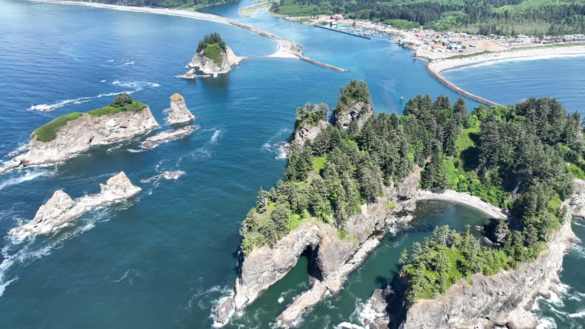 Rugged sea stacks are found off of the scenic Rialto Beach in Olympic National Park, Washington. This area is found at the mouth of the Quillayute River along the west coast of the Olympic peninsula.
