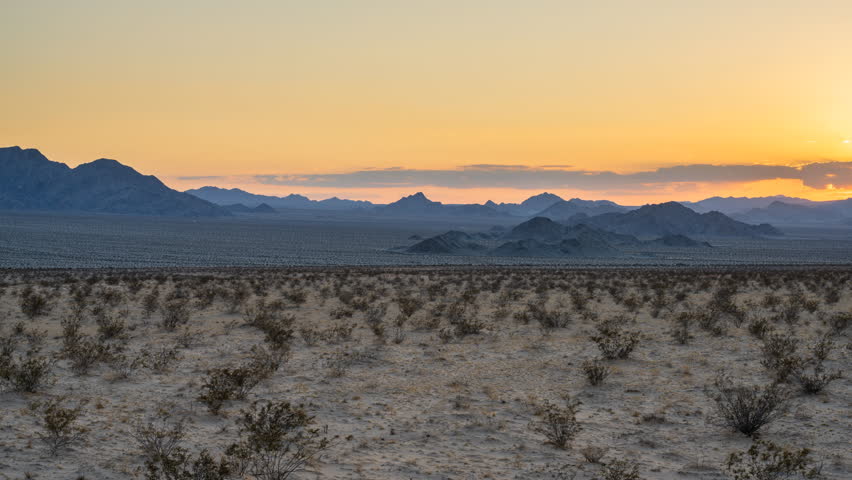 Golden sunset time lapse across the Cadiz Valley toward the Sheephole Valley Wilderness