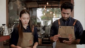 4k, Asian barista woman happy present new coffee bean making hot espresso for manager, Indian man checking order online using technology tablet, male and female business partnership working together 
 - Powered by Shutterstock - Get 15% off with code: PIKWIZARD15