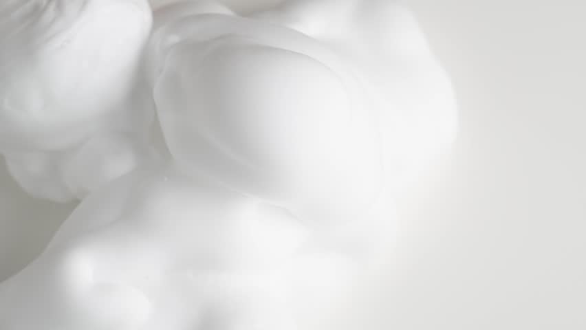 Hair foam mousse, macro. Beauty background. Close up of white cloud of hair mousse or shaving foam. Royalty-Free Stock Footage #1107205043
