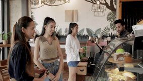 4k, busy business owner take order from female customer standing in front of homemade bakery cabinet, barista man making hot coffee, small business startup couple restaurant cafe coffee shop concept
 - Powered by Shutterstock - Get 15% off with code: PIKWIZARD15