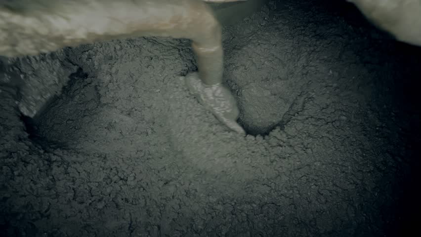 mixing concrete mixture in a large mixer 50fps Slow motion Royalty-Free Stock Footage #1107214367