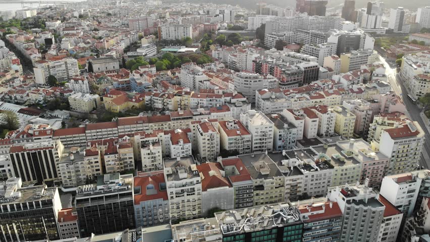 Panoramic aerial view to Lisboa Portugal city. Aerial drone view. Flying over. . High quality 4k footage Royalty-Free Stock Footage #1107215175
