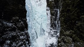 Glymur Canyon Frozen Waterfall During Winter in Iceland with Flying Seagulls - Powered by Shutterstock - Get 15% off with code: PIKWIZARD15