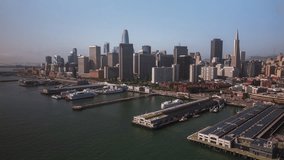 Establishing Aerial View Shot of San Francisco CA, California, United States, America, downtown, port of San Francisco, pull back and up, reveal