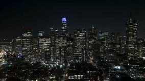 Establishing Aerial View Shot of San Francisco at night evening CA, California, United States, America, downtown, monumental view, circling right, super clear image