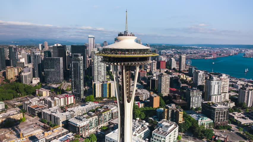 July 2023: Establishing Aerial View Shot of Seattle WA, Washington US, Space Needle, wonderful day, circling very close