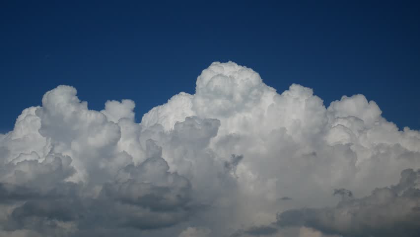 Fluffy clouds in the sky video nature background with copy space