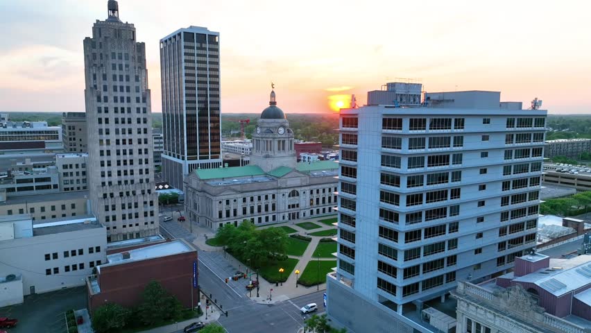 Aerial dolly shot toward Allen County Courthouse at sunrise