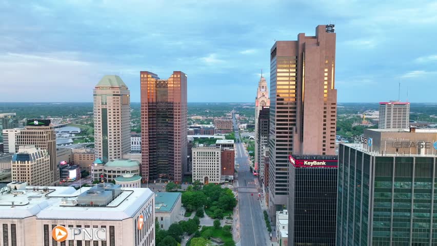 Slow aerial video passing between skyscrapers in downtown Columbus Ohio