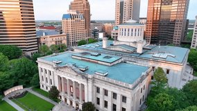 Ohio state house aerial video from roof to entrance shot at sunrise