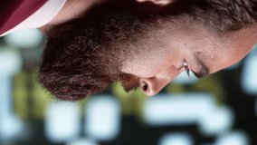 Vertical video Entrepreneur strolling around town and admiring urban buildings near city center, businessman on night promenade. Confident man walking under streetlamps on sidewalk, downtown district - Powered by Shutterstock - Get 15% off with code: PIKWIZARD15