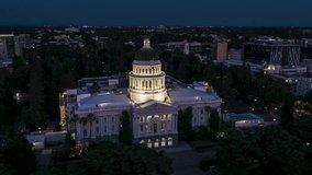 Establishing Aerial View Shot of Sacramento at night evening CA, California State Capital, California, USA, State Capitol, perfect clear image, circling right fast