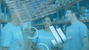 Animation of data processing over team of diverse volunteers high fiving each other at warehouse. Donation and volunteering concept - Powered by Shutterstock - Get 15% off with code: PIKWIZARD15