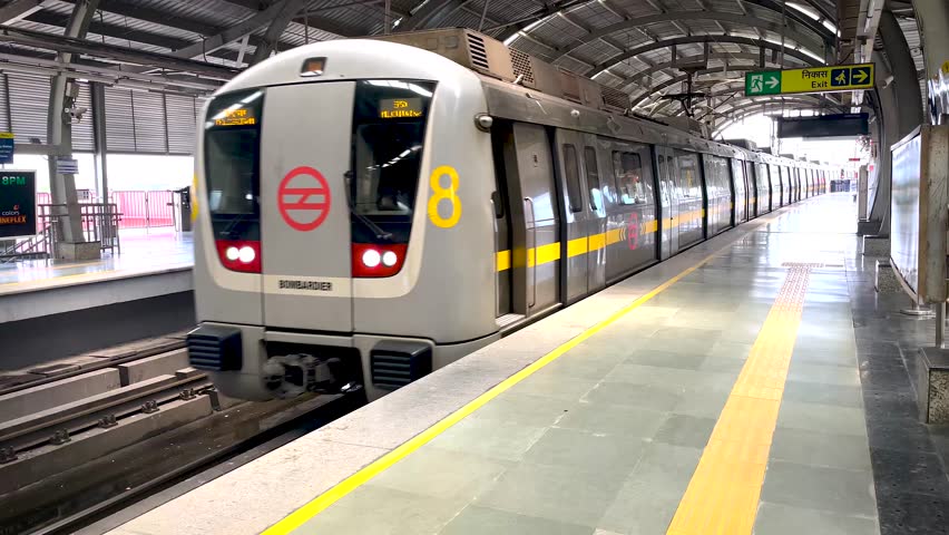 Metro train arriving at a station in India Royalty-Free Stock Footage #1107243969