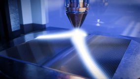 A modern 3D printer is printing a metal turbine. The future of machine part manufacturing. Time lapse video