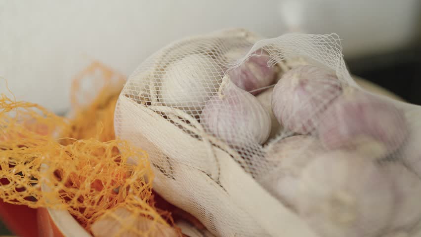 White Garlic Onion in a Bag Close Up