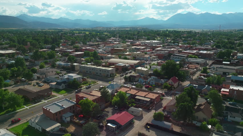 Salida Colorado aerial cinematic drone mid summer downtown S Lime Mill near Buena Vista on Arkansas River Riverside Park Scout surfing wave biking hiking rafting Rocky Mountain forward movement