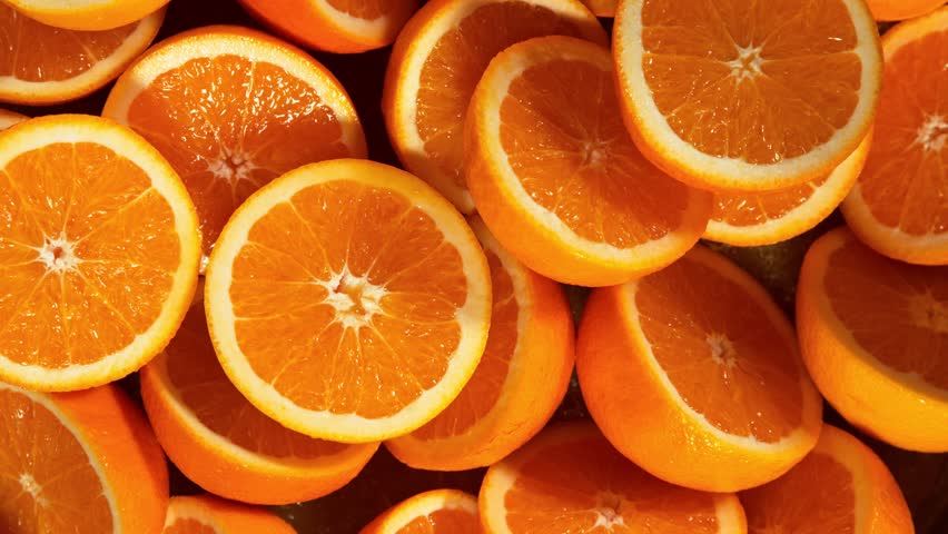 Super Slow Motion Shot of Splashing Fresh Oranges. Filmed on High Speed Cinematic Camera at 1000fps.