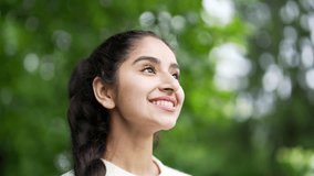 Close up face woman enjoying nature taking deep breaths of fresh air standing among trees in forest or park. Outdoors closing Female girl Inhaling and Exhaling eyes calm rest and stress relief Closeup - Powered by Shutterstock - Get 15% off with code: PIKWIZARD15