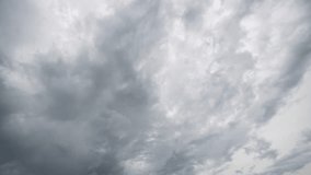 4k time lapse video with storm clouds moving fast on the dark sky. Summer storm concept video with different types of clouds.