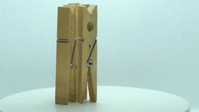 wooden clothespin rotates in a circle