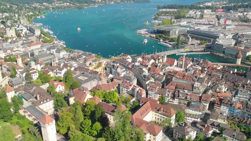 Historic city center of Lucerne with famous Chapel Bridge and lake Lucerne (Vierwaldstattersee), Canton of Luzern, Switzerland Royalty-Free Stock Footage #1107260337