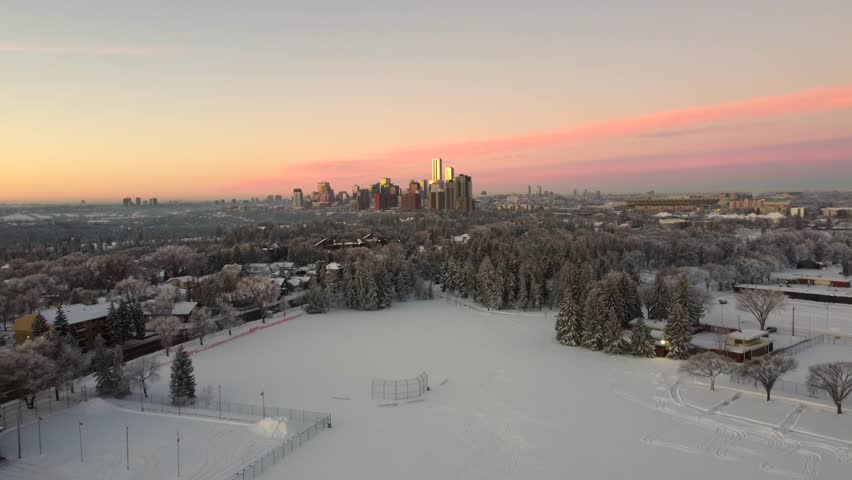 An aerial view of the Edmonton cityscape at sunset in winter in Alberta, Canada