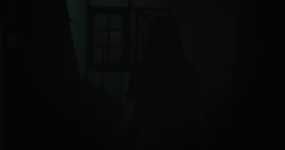 Horror scene of a mysterious Scary Asian ghost woman creepy have hair covering the face walking to camera at abandoned house with dark scene movie at night, festival Halloween concept Royalty-Free Stock Footage #1107266889