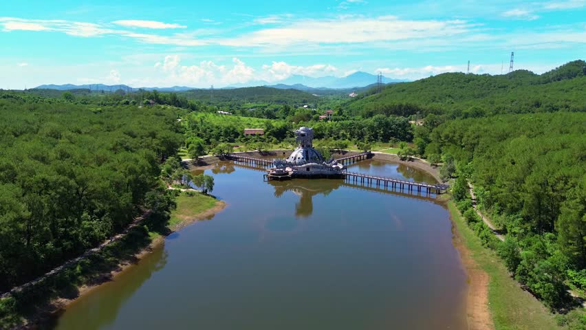 Aerial view of Ho Thuy Tien abandoned water park with huge dragon structure and empty lake in Hue, Vietnam Royalty-Free Stock Footage #1107267523