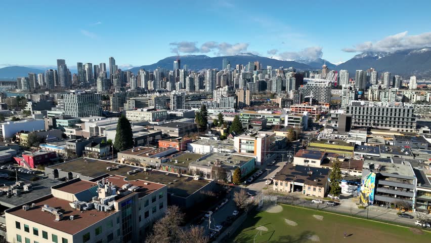 Aerial View Of Vancouver Skyline At Mount Pleasant District In BC, Canada. pan-shot
