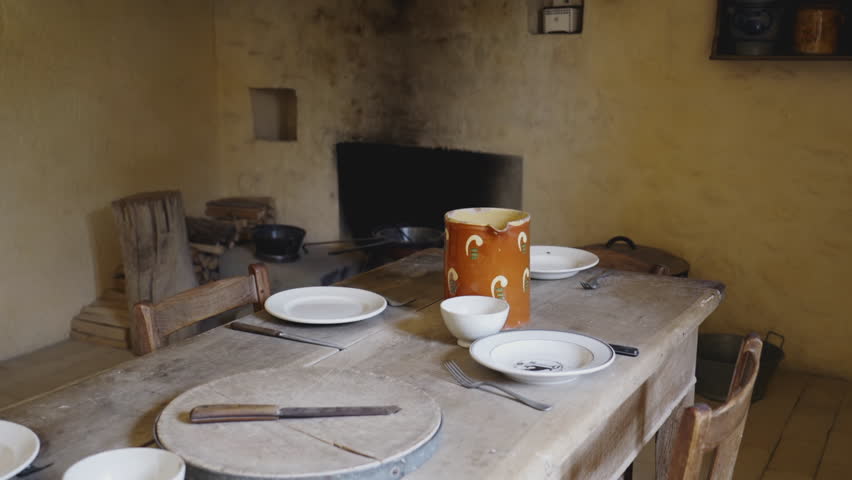 Humble Farmhouse Dining Area with Traditional Wooden Furnishings, Antique Wooden Dining Setup in Rustic Farmhouse Interior