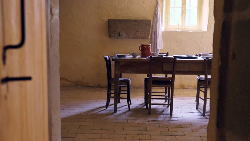 Humble Farmhouse Dining Area with Traditional Wooden Furnishings