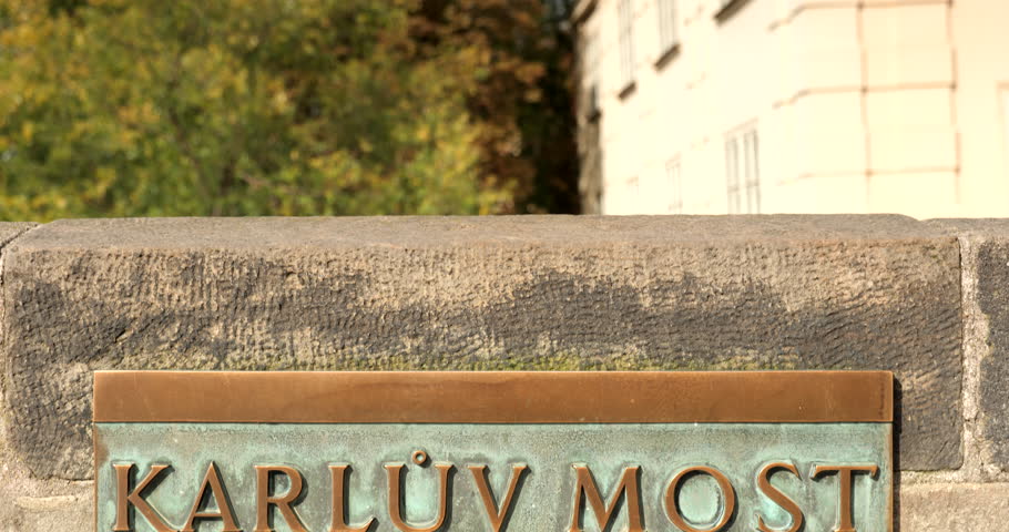 Charles bridge brass sign over the Vlatava River in Czech Republic Czechia Europe