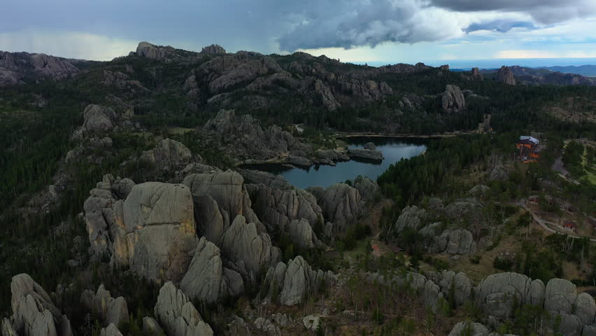 A small lake is nestled into the Black Hills of South Dakota