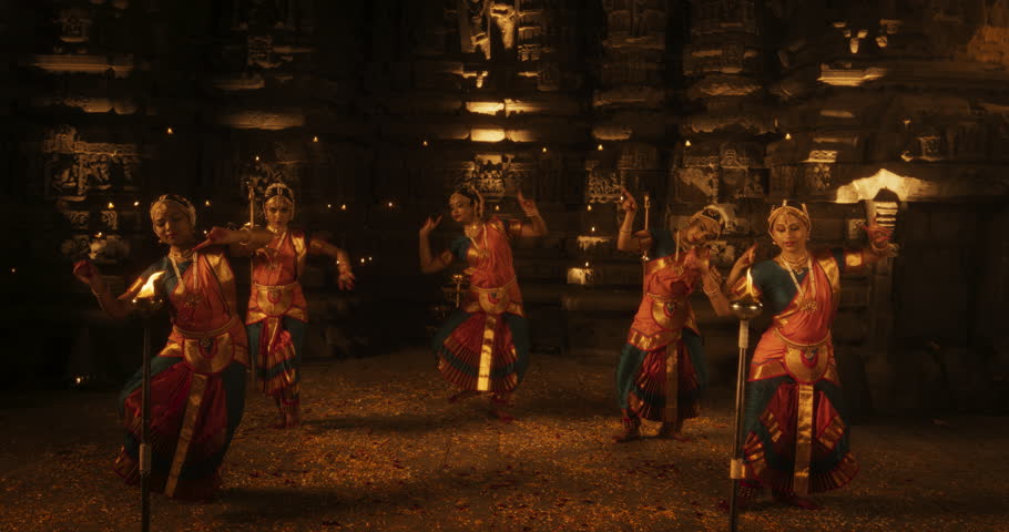 Slow Motion Portrait of Energetic Group of Indian Women Joyfully Dancing Traditional Folk Dance Inside an Empty Historical Temple. Colorful and Captivating South Asian Cultural Celebration Royalty-Free Stock Footage #1107282733