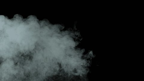 Smoke on black background in slow motion, steam mist on black