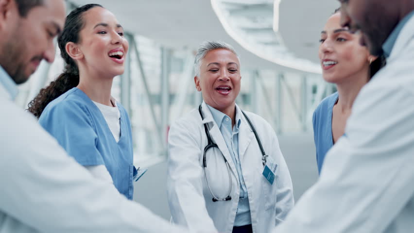 Success, applause and teamwork with doctors in hospital for celebration, medical and support. Community, medicine and healthcare with people in clinic for diversity, collaboration and motivation Royalty-Free Stock Footage #1107305675