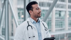 Man, tablet and a doctor walking in a hospital with internet for research, results or information. Medical staff, health care and asian person with tech for email, online consultation or telehealth - Powered by Shutterstock - Get 15% off with code: PIKWIZARD15
