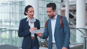 Woman, man and point for direction at airport concierge, help and question with check in lobby. Confused entrepreneur, airline service employee and show documents for identity, travel and information - Powered by Shutterstock - Get 15% off with code: PIKWIZARD15