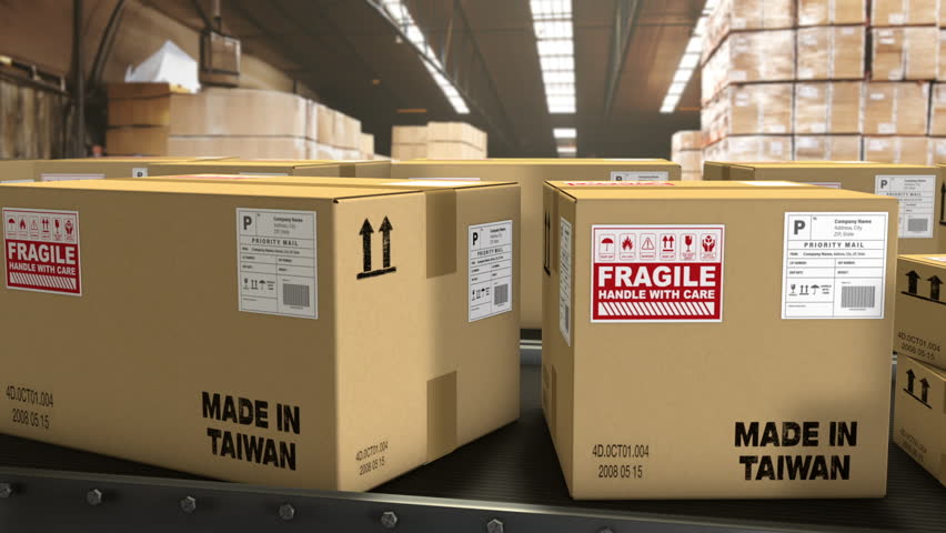 in a warehouse, boxes on a conveyor belt with the mention Made in China. Royalty-Free Stock Footage #1107319545