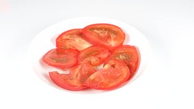 sliced tomato cut up, video clip