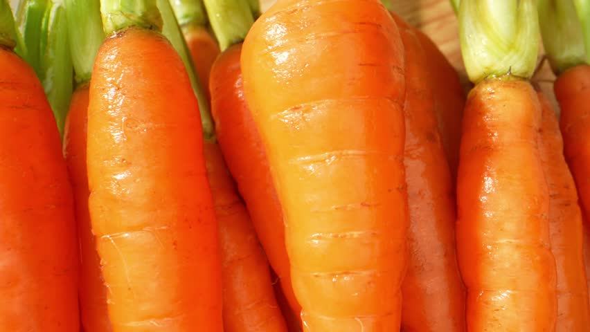 Baby carrots are a nutritious snack option. They are a good source of vitamins, particularly vitamin A, vitamin K, vitamin C. minerals such as potassium and fiber, which contribute to a healthy diet.
 Royalty-Free Stock Footage #1107351515